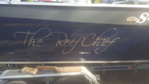 Mirrored stainless steel boat signage