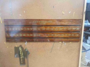 Gold leaf timber plaque